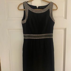 White House Black Market knee length black dress in a size 6.
